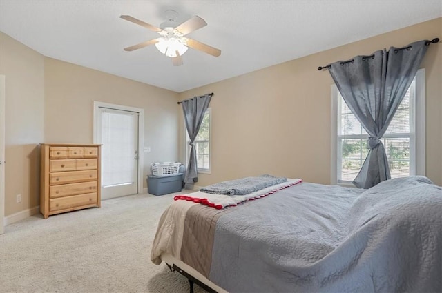 bedroom featuring ceiling fan and carpet floors