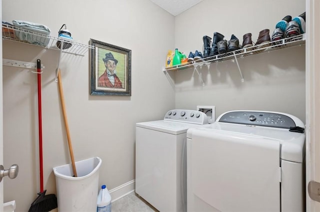 laundry area featuring independent washer and dryer