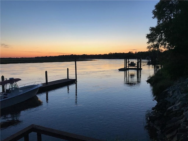 dock area featuring a water view