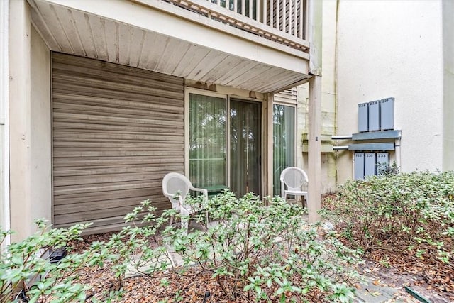 property entrance with a balcony