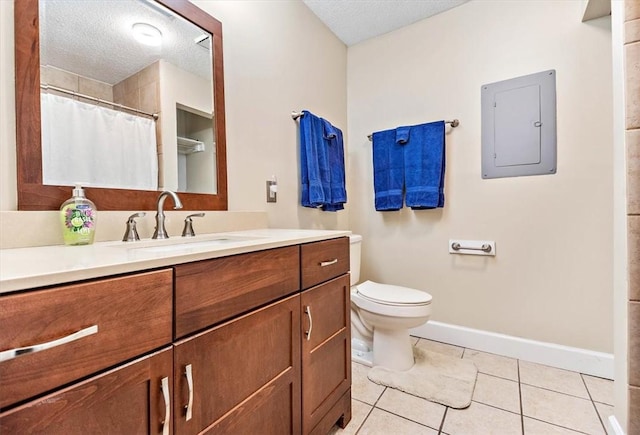 bathroom with vanity, a textured ceiling, tile patterned flooring, electric panel, and toilet