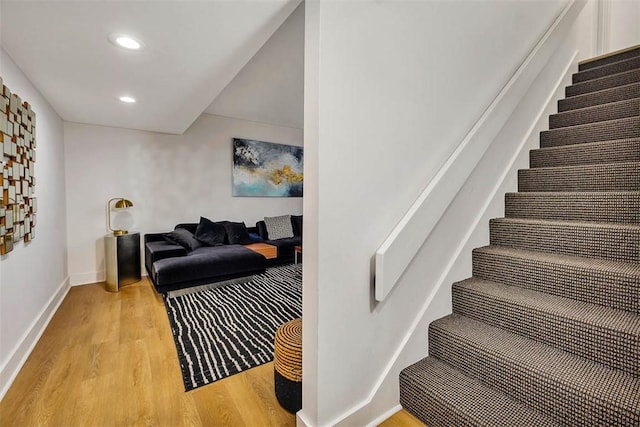 stairway with wood-type flooring