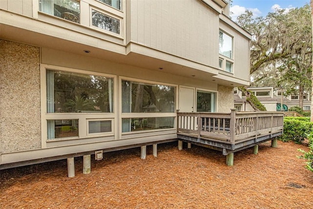 rear view of house with a deck