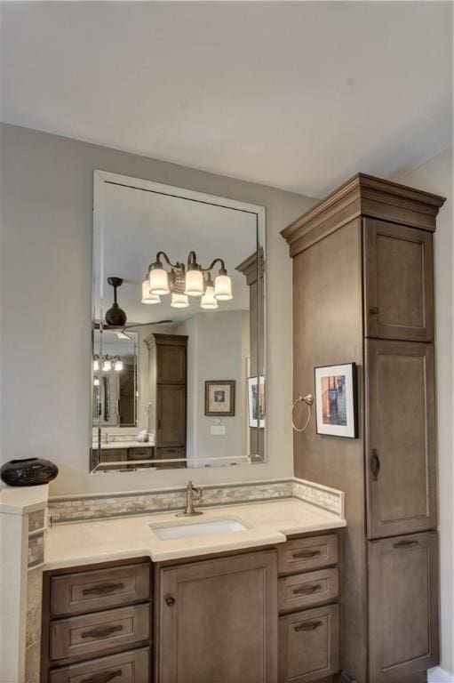 bathroom with tile patterned flooring and vanity