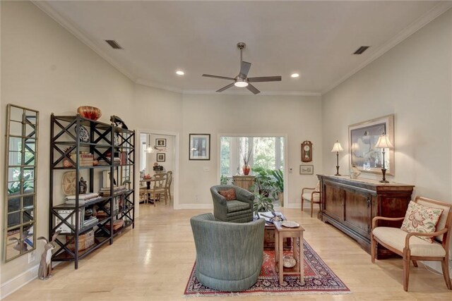 kitchen with ceiling fan, sink, light hardwood / wood-style flooring, pendant lighting, and appliances with stainless steel finishes