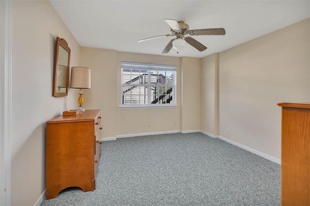 1056 Fiddler Trce, Townsend, GA 31331 - spare room with carpet flooring and a ceiling fan
