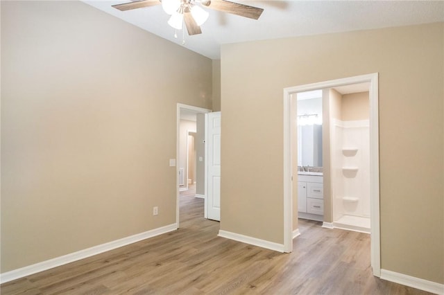 104 Bamboo Dr, Kingsland, GA 31548 - unfurnished bedroom with light wood-type flooring, lofted ceiling, ensuite bath, and a ceiling fan