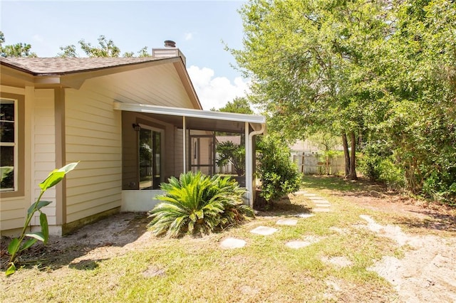 104 Bamboo Dr, Kingsland, GA 31548 - view of yard with a sunroom