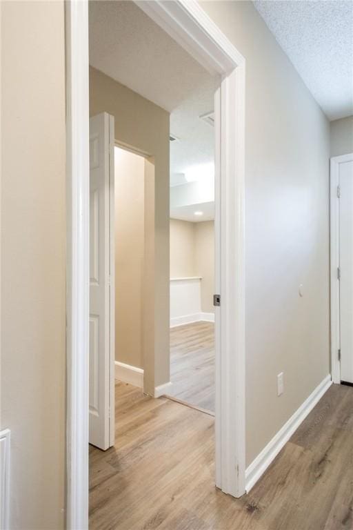 104 Bamboo Dr, Kingsland, GA 31548 - hallway with wood finished floors and baseboards