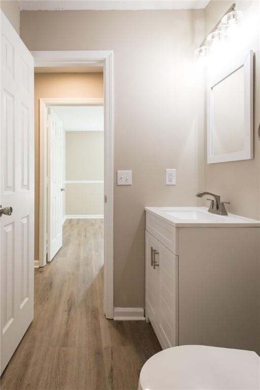 104 Bamboo Dr, Kingsland, GA 31548 - bathroom with wood finished floors and vanity