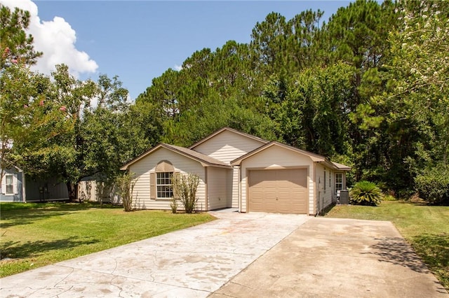 104 Bamboo Dr, Kingsland, GA 31548 - ranch-style house featuring an attached garage, a front yard, and driveway