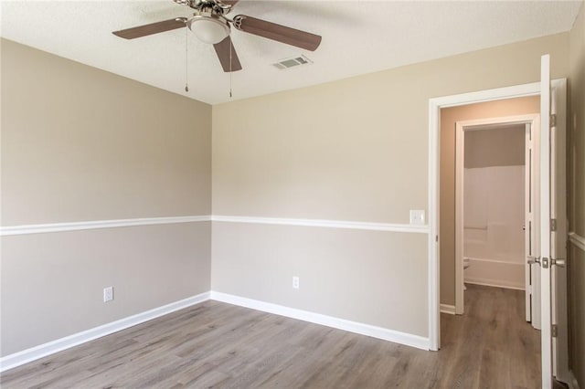 104 Bamboo Dr, Kingsland, GA 31548 - unfurnished room with wood finished floors and a ceiling fan