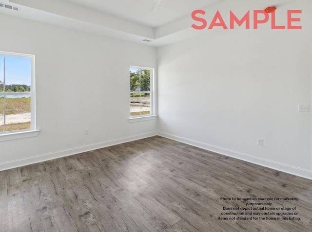 empty room featuring hardwood / wood-style floors