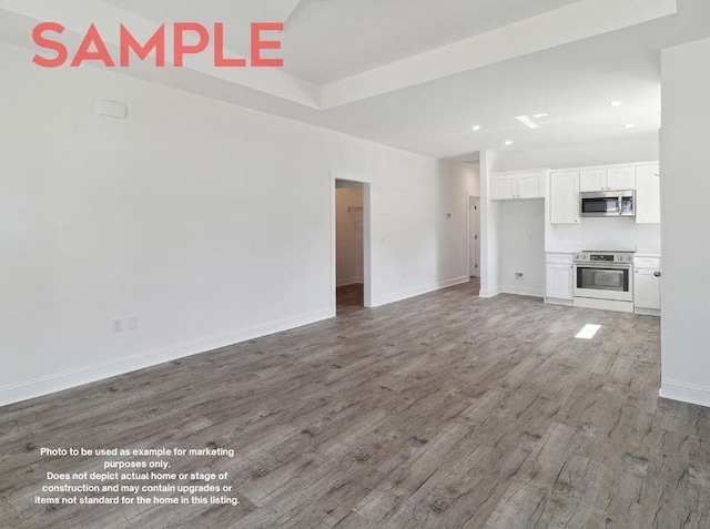 unfurnished living room featuring dark hardwood / wood-style floors