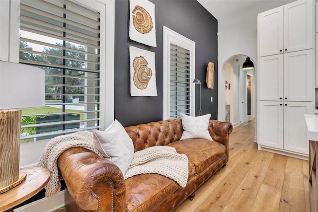 interior details featuring hardwood / wood-style floors and wine cooler