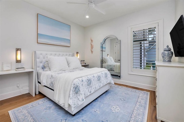 bedroom featuring ceiling fan and light wood-type flooring