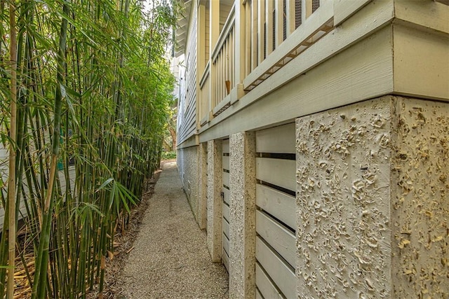 view of side of property featuring a balcony