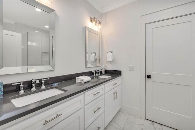 bathroom with a shower with door, vanity, and ornamental molding