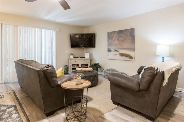 200 Salt Air Dr Unit 139, Saint Simons Island, GA 31522 - living area featuring light wood-type flooring, ceiling fan, and baseboards