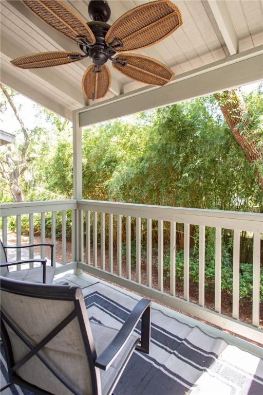 200 Salt Air Dr Unit 139, Saint Simons Island, GA 31522 - wooden terrace featuring a ceiling fan