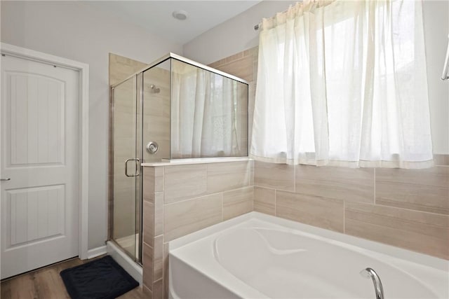 64 Wellington Cir, Brunswick, GA 31525 - bathroom with a garden tub and a shower stall