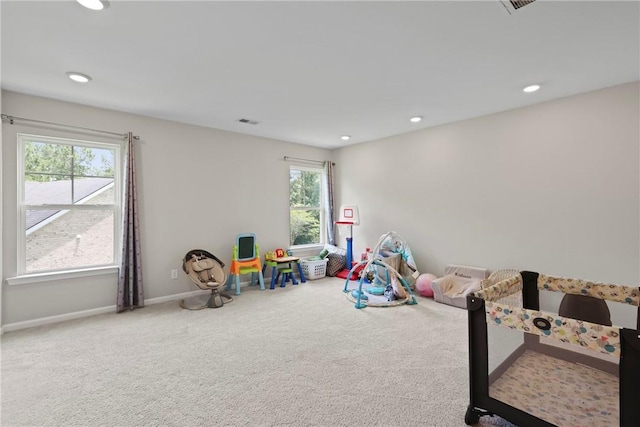 64 Wellington Cir, Brunswick, GA 31525 - playroom featuring carpet flooring, healthy amount of natural light, and recessed lighting