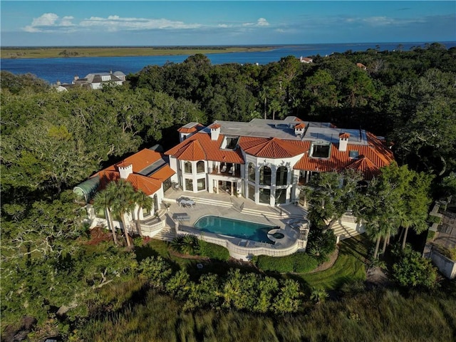 drone / aerial view with a water view