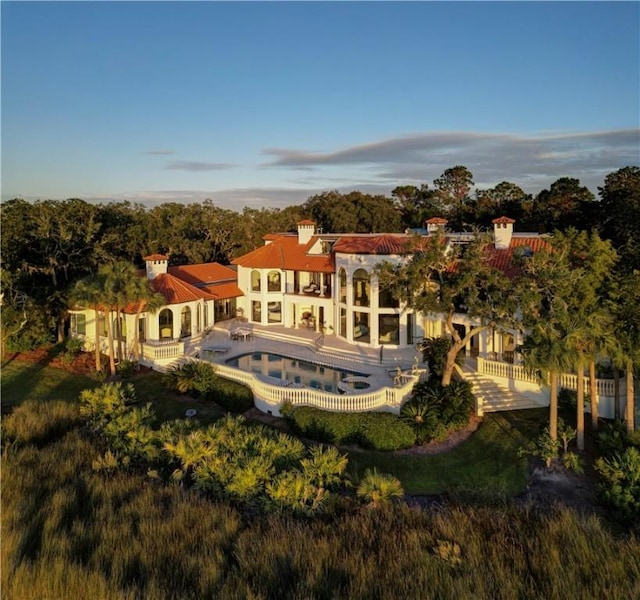 rear view of property with a patio area