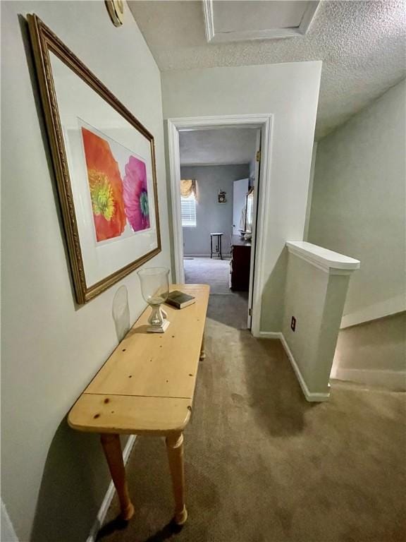 622 Brockinton Pt, Saint Simons Island, GA 31522 - hallway featuring carpet flooring and a textured ceiling