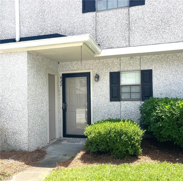 622 Brockinton Pt, Saint Simons Island, GA 31522 - property entrance featuring stucco siding