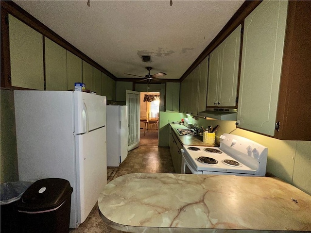 kitchen featuring ceiling fan, white appliances, ornamental molding, and green cabinetry