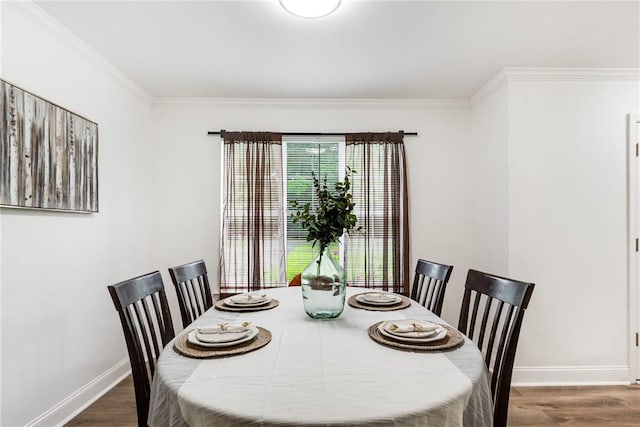 416 S Deals Cir, Woodbine, GA 31569 - dining space with wood finished floors, baseboards, and ornamental molding