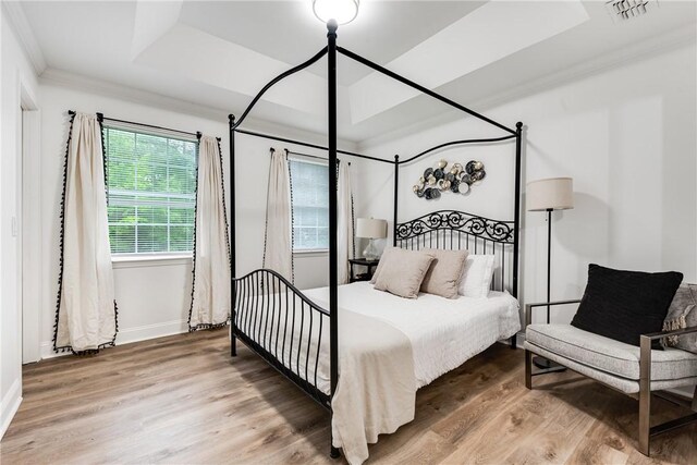 416 S Deals Cir, Woodbine, GA 31569 - bedroom featuring wood finished floors, baseboards, and ornamental molding