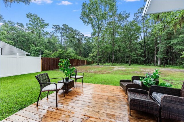416 S Deals Cir, Woodbine, GA 31569 - deck featuring an outdoor living space