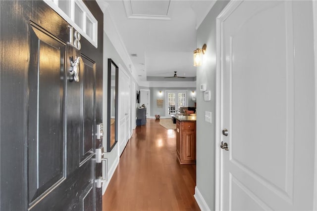 interior space with baseboards and dark wood finished floors