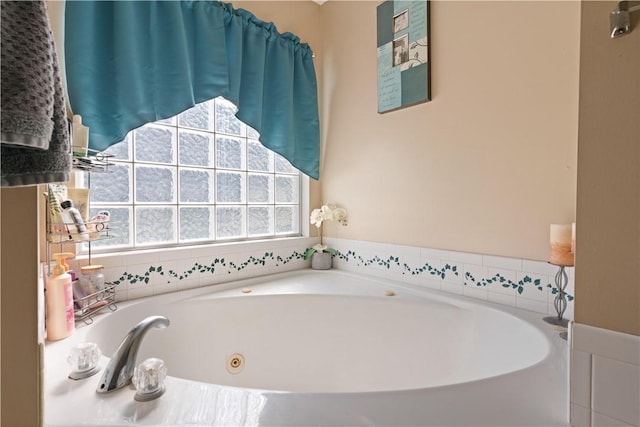 bathroom featuring a tub to relax in