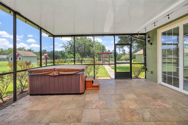 110 Rachel Way, Brunswick, GA 31523 - sunroom featuring a jacuzzi and rail lighting