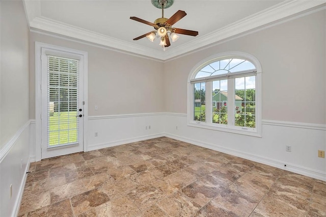 110 Rachel Way, Brunswick, GA 31523 - unfurnished room featuring stone finish flooring, ceiling fan, crown molding, and a wainscoted wall