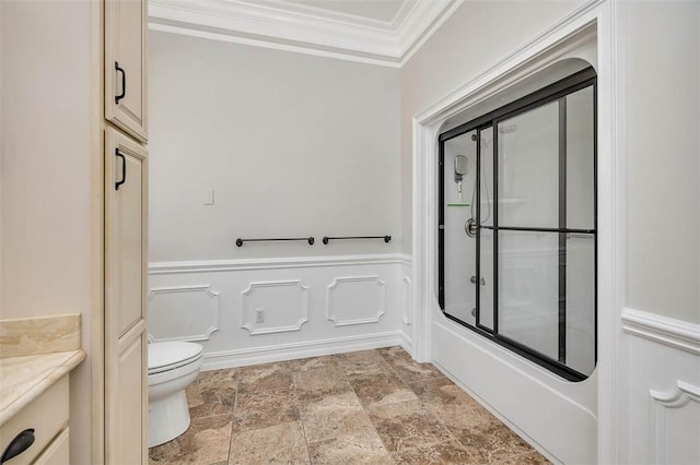 110 Rachel Way, Brunswick, GA 31523 - bathroom featuring crown molding, stone finish flooring, vanity, a wainscoted wall, and a decorative wall