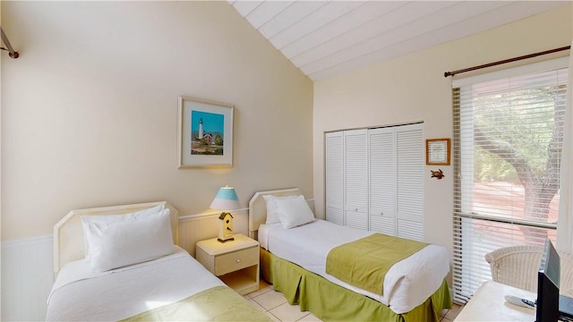 bedroom featuring a closet and vaulted ceiling