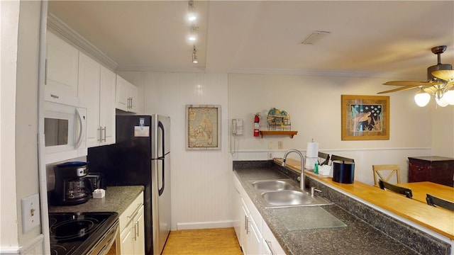 kitchen with crown molding, sink, ceiling fan, black range with electric cooktop, and white cabinetry