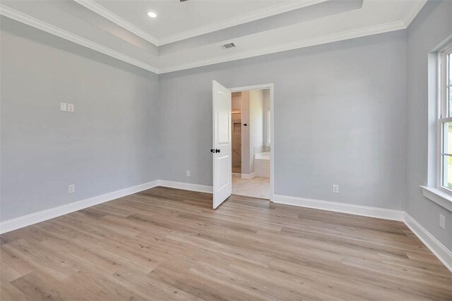 117 Rachel Way, Brunswick, GA 31523 - empty room featuring crown molding, a tray ceiling, light wood-type flooring, and recessed lighting