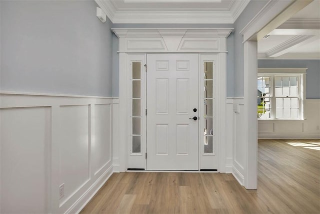 117 Rachel Way, Brunswick, GA 31523 - foyer entrance with a decorative wall, ornamental molding, light wood-type flooring, and a wainscoted wall