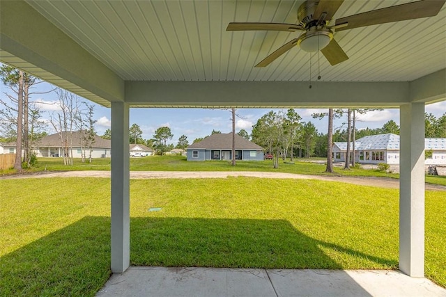 117 Rachel Way, Brunswick, GA 31523 - view of grassy yard with ceiling fan and a residential view