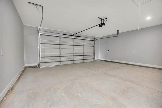 117 Rachel Way, Brunswick, GA 31523 - garage with baseboards and a garage door opener