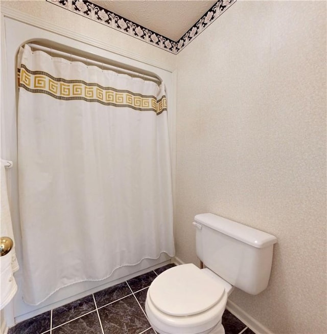 1457 N River Oaks Dr, Blackshear, GA 31516 - bathroom featuring toilet and shower / bath combo
