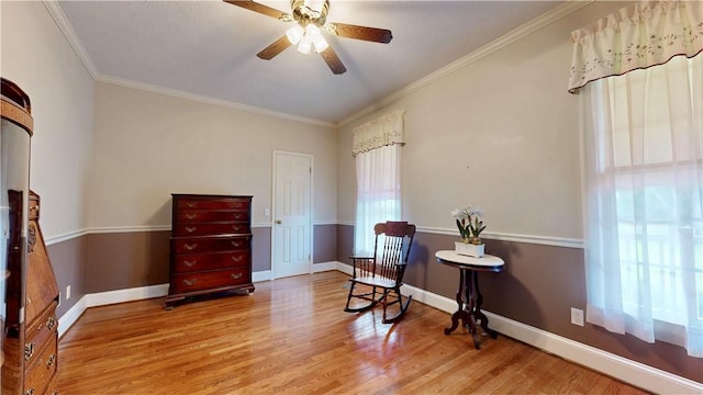 1457 N River Oaks Dr, Blackshear, GA 31516 - sitting room with wood finished floors, ornamental molding, and ceiling fan