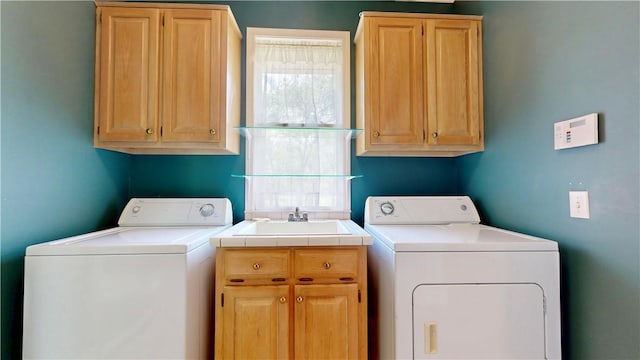 1457 N River Oaks Dr, Blackshear, GA 31516 - washroom with cabinet space, independent washer and dryer, and healthy amount of natural light