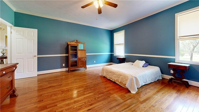 1457 N River Oaks Dr, Blackshear, GA 31516 - bedroom featuring wood finished floors, ornamental molding, and ceiling fan