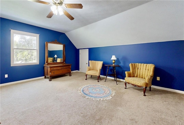 1457 N River Oaks Dr, Blackshear, GA 31516 - living area with carpet floors, vaulted ceiling, and a ceiling fan